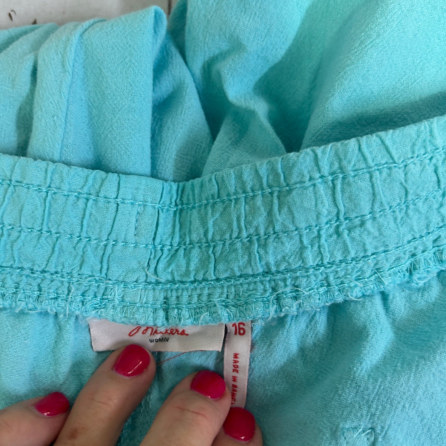 Light blue shorts waistband detail view