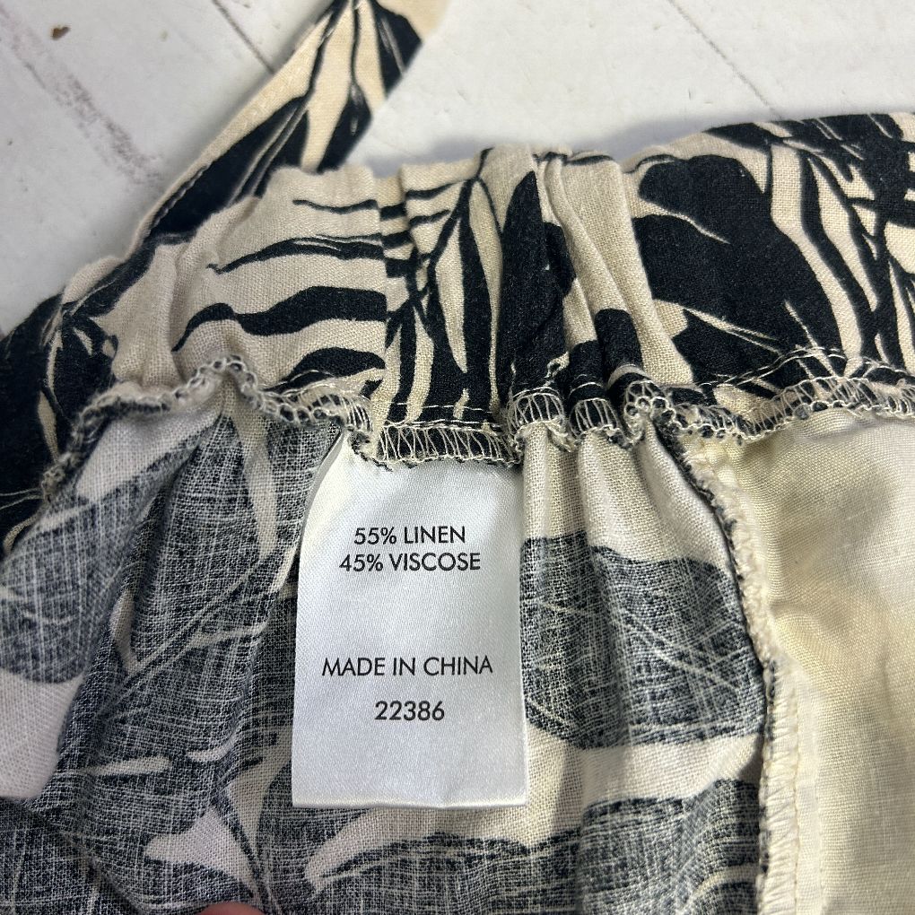 Cream and black striped linen viscose blend pants label detail view