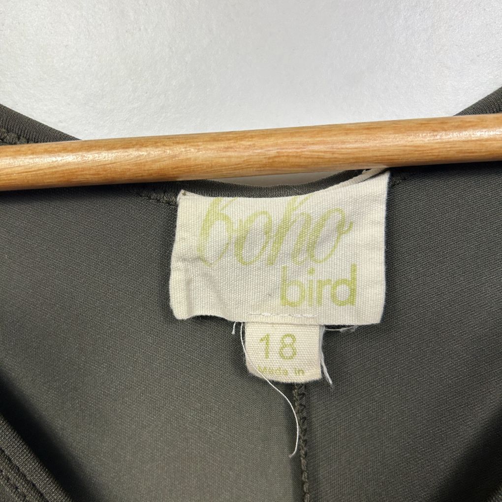 Black garment label detail view