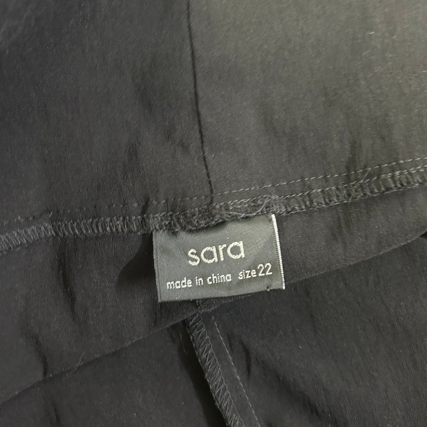Grey clothing label detail view
