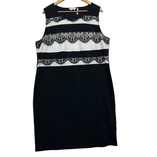 Black and white striped sleeveless dress front view