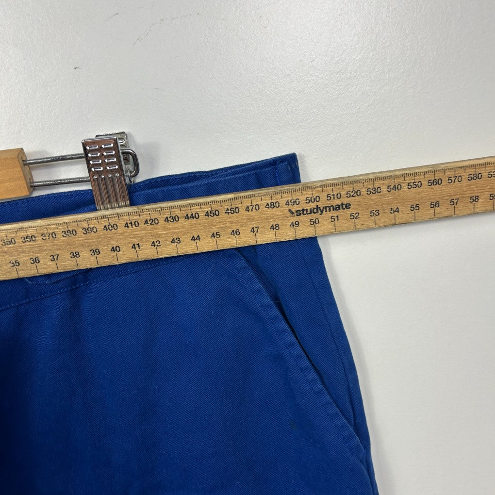 Blue shorts with measuring tape detail view