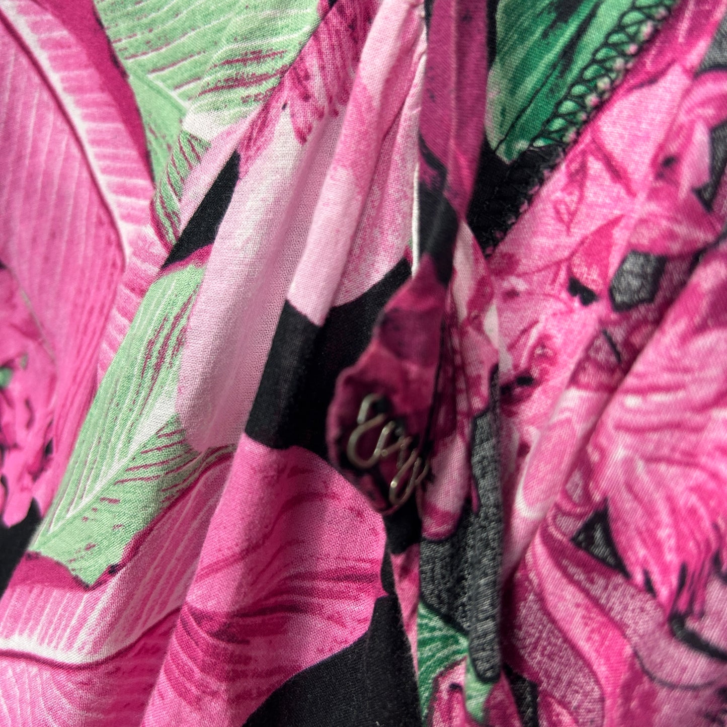 Pink and green floral dress detail view