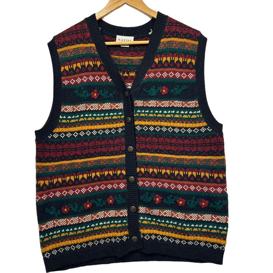 Navy knit vest with multicolour geometric patterned stripes front view