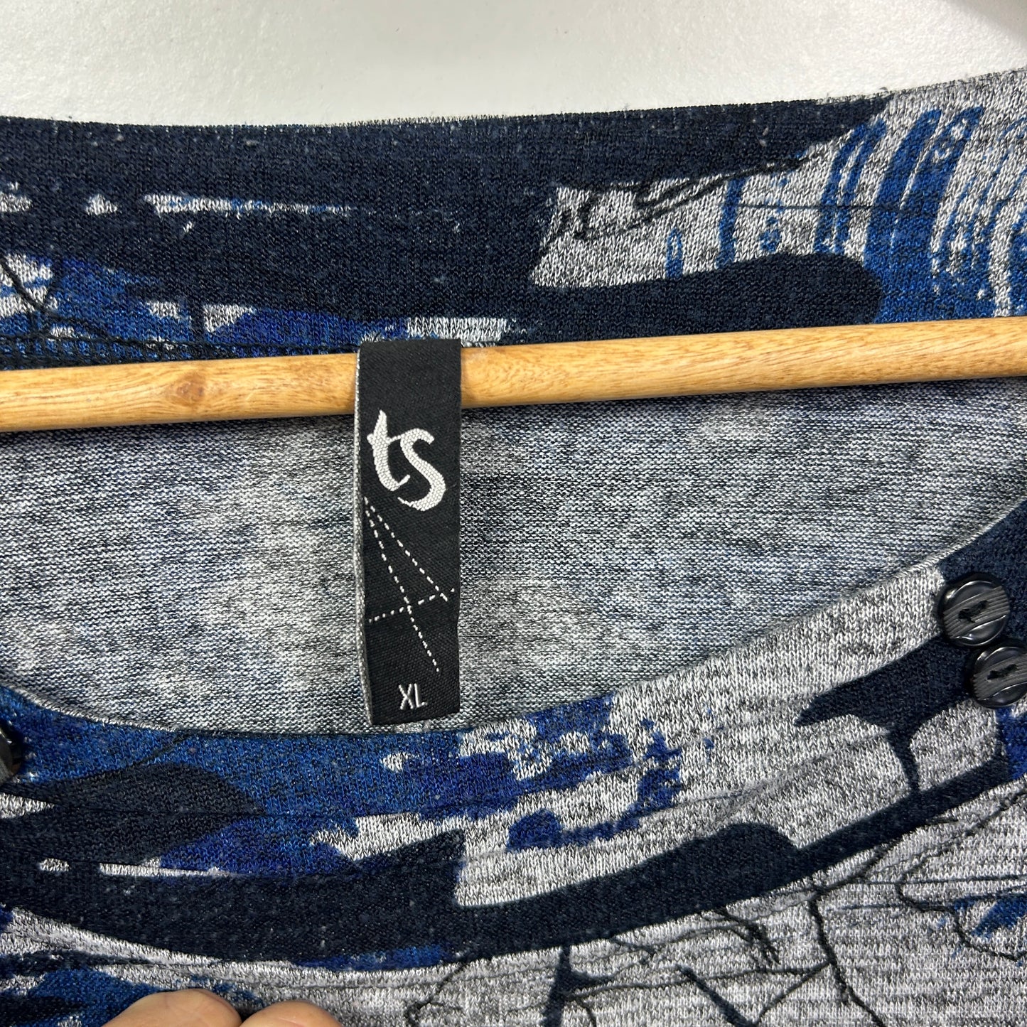 Navy and grey graphic print long sleeve top label view