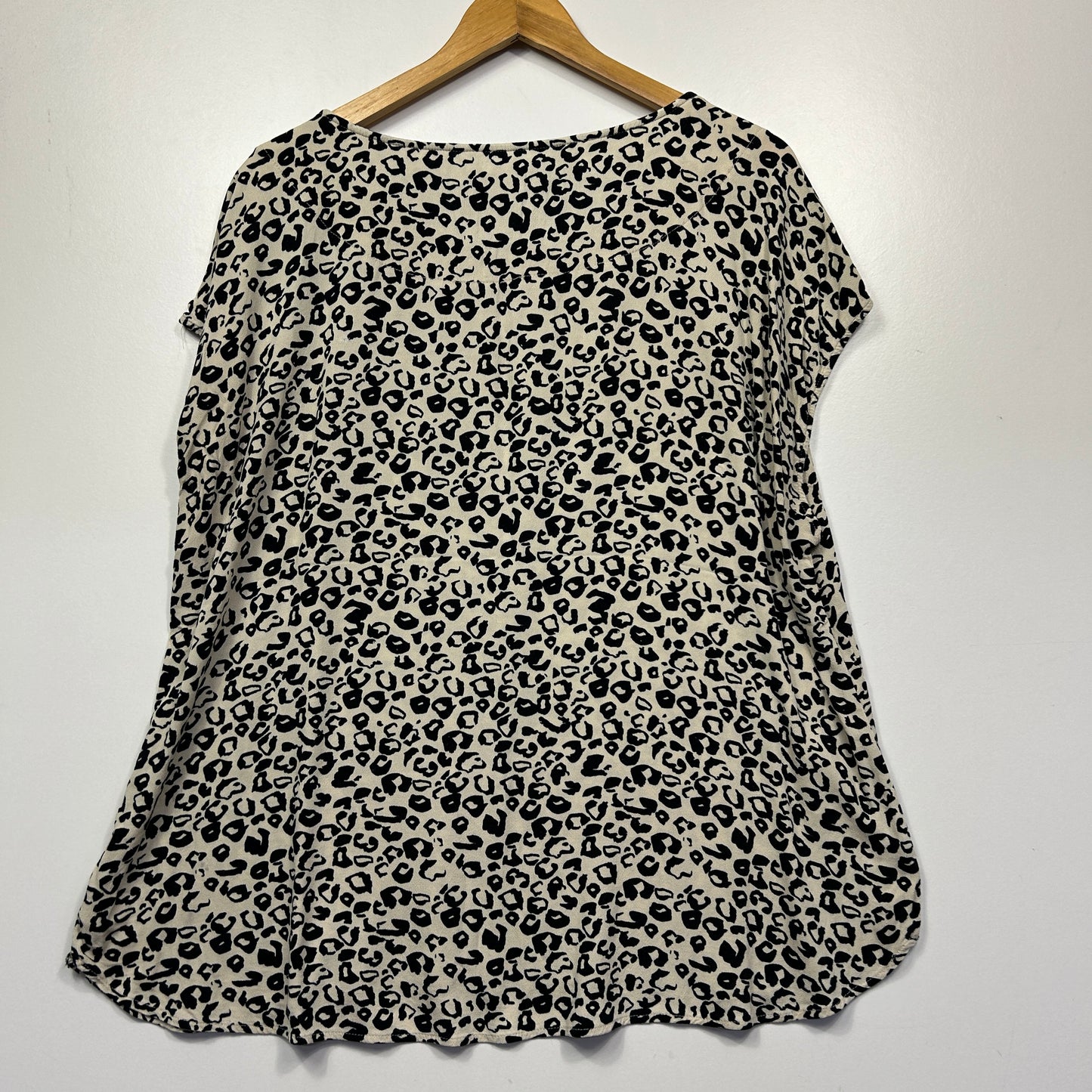 Black and cream leopard print short sleeve top front view