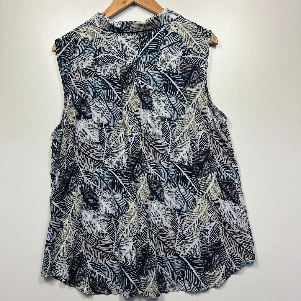 Navy and white leaf print sleeveless shirt front view