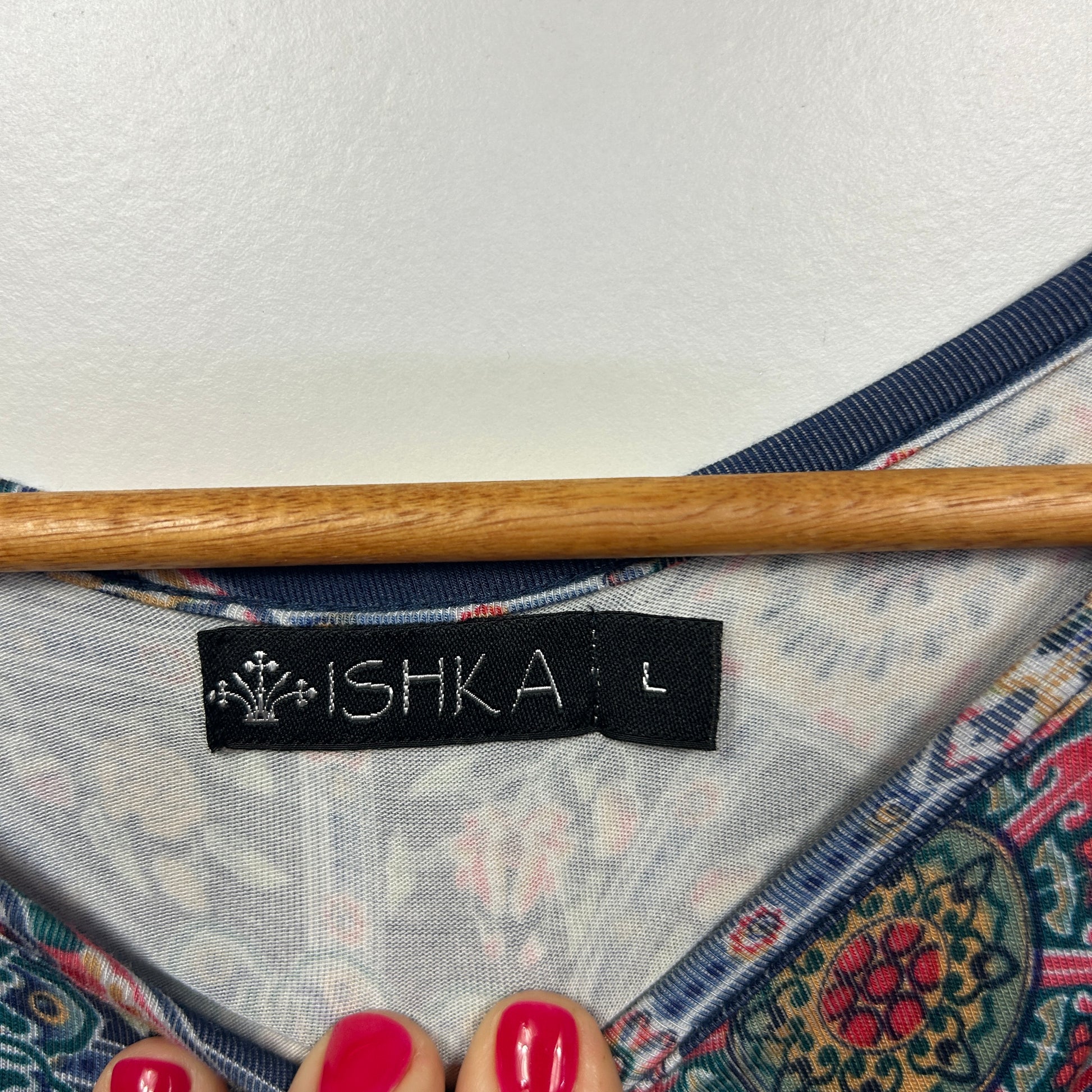 ISHKA light blue long sleeve top label detail view