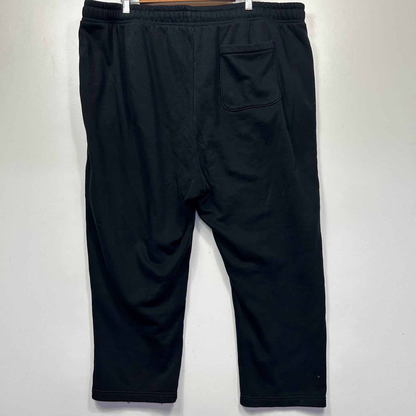 Black trousers back view