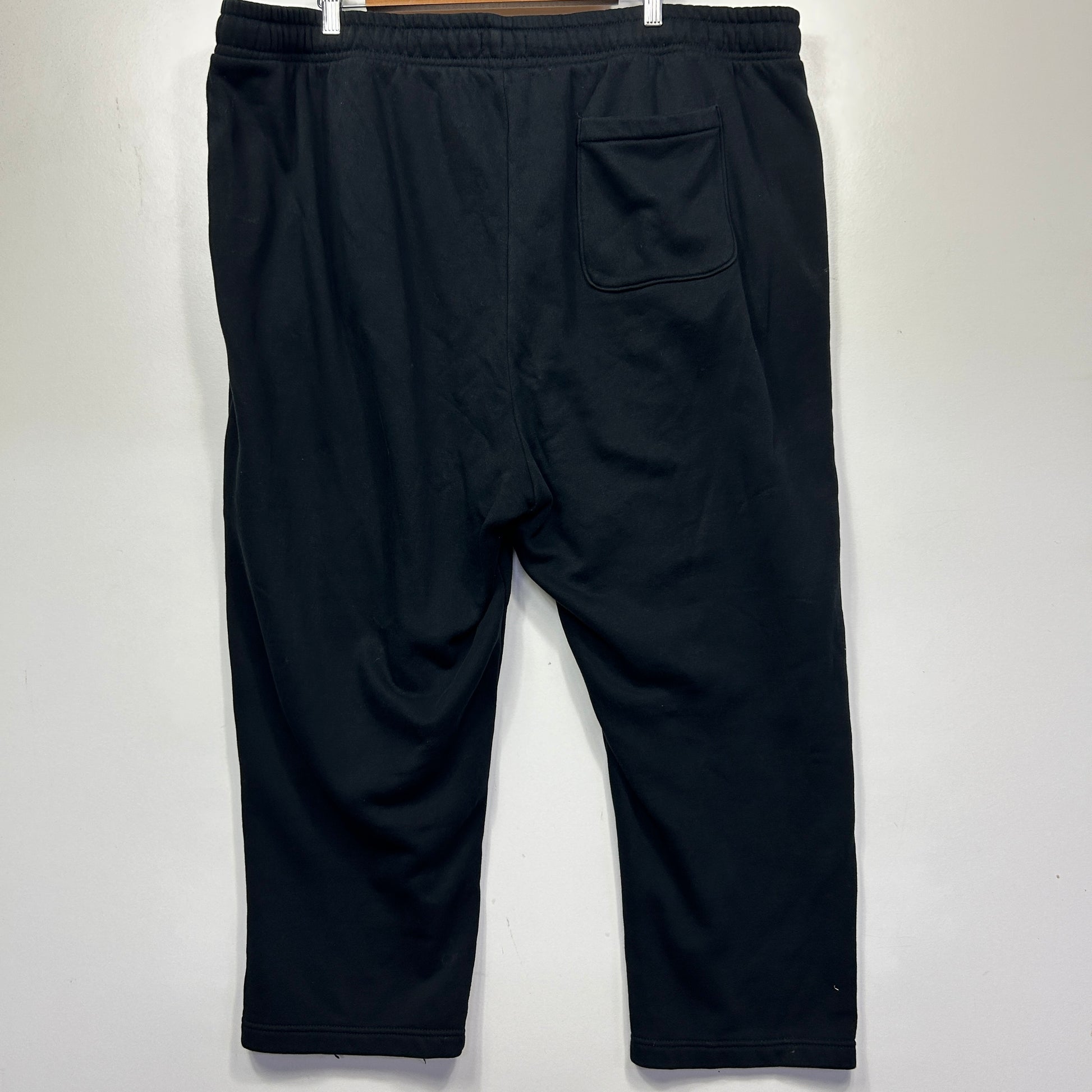 Black trousers back view