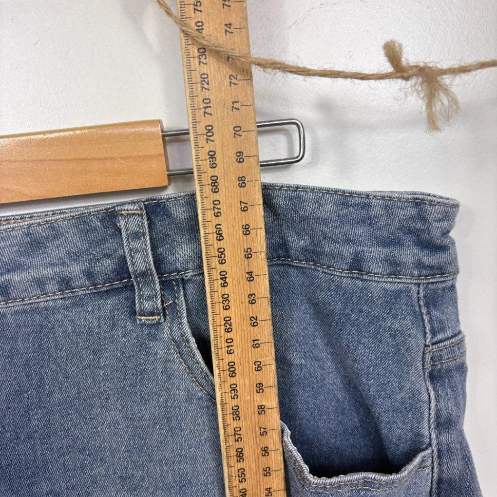 Blue denim jeans front view with measuring tape