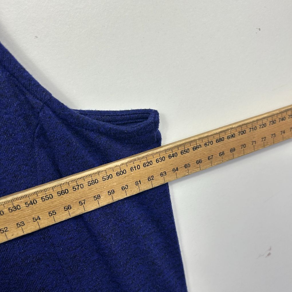 Blue fabric with measuring tape detail view