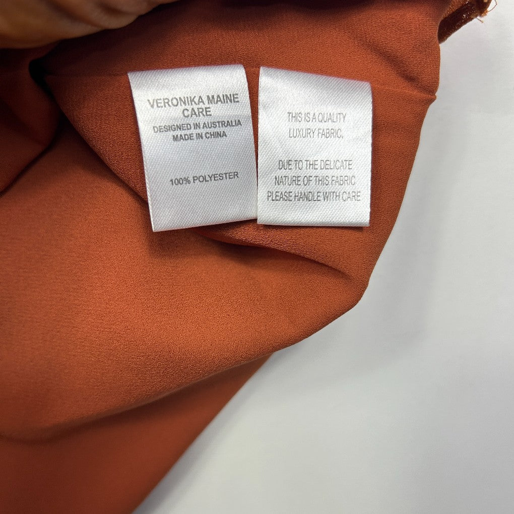 Rust orange fabric label detail view