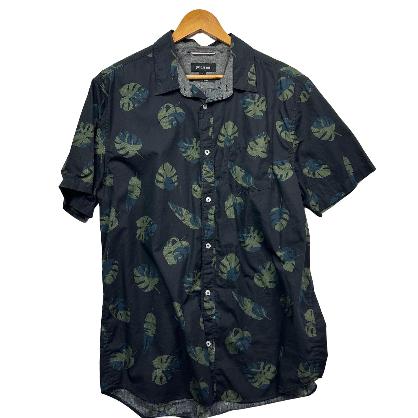 Navy short sleeve shirt with green leaf pattern front view