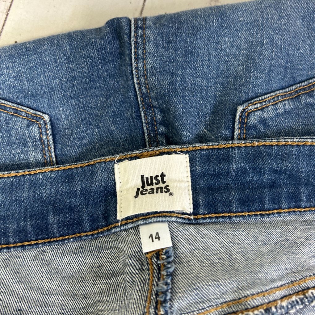 Blue denim jeans label detail view