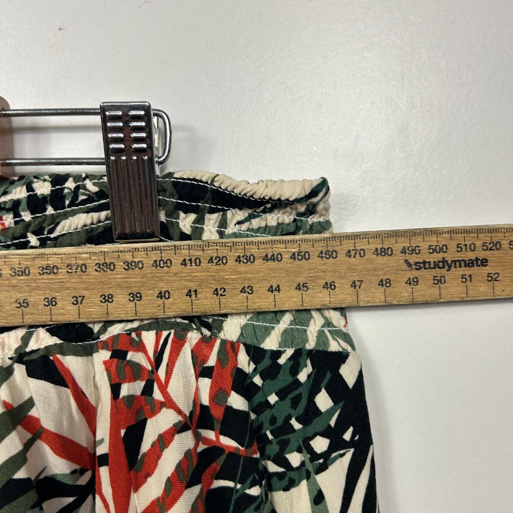 Patterned belts detail view with measuring tape