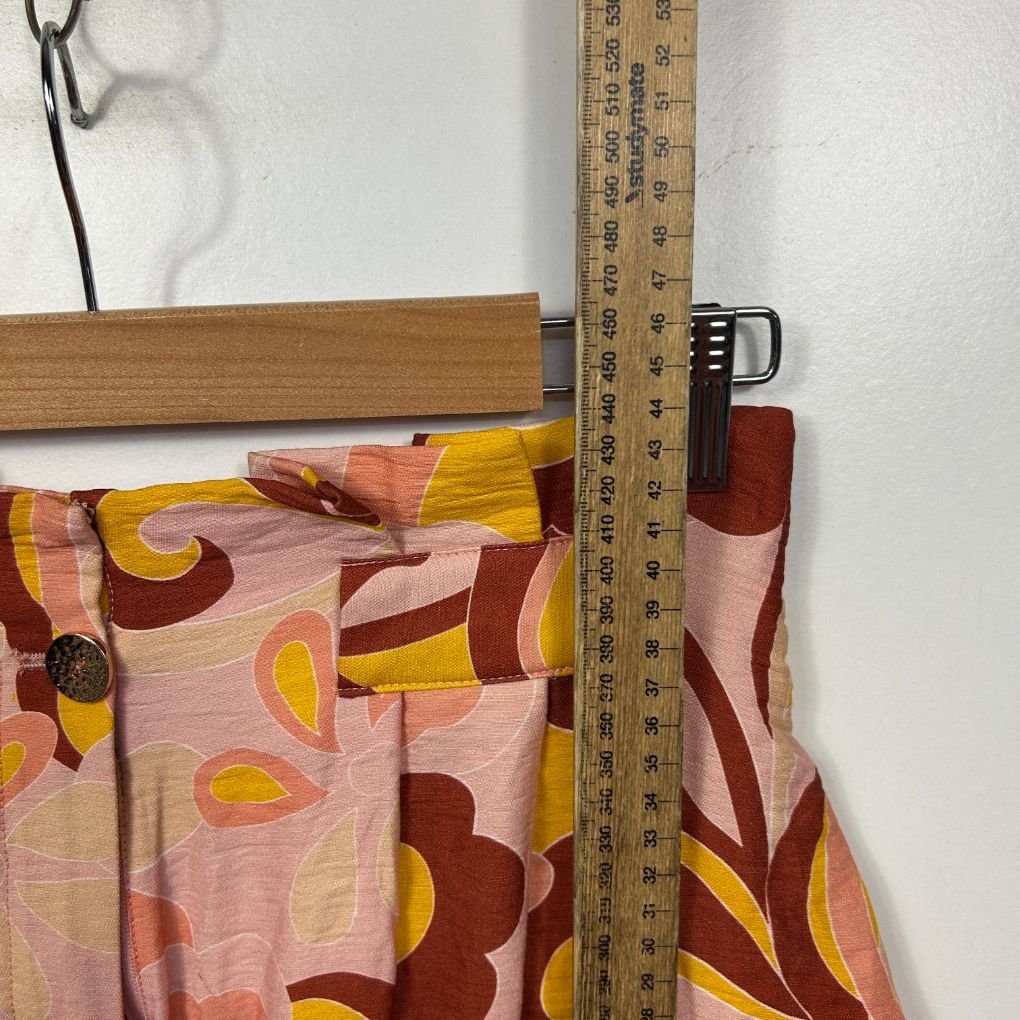 Pink fabric with floral pattern detail view