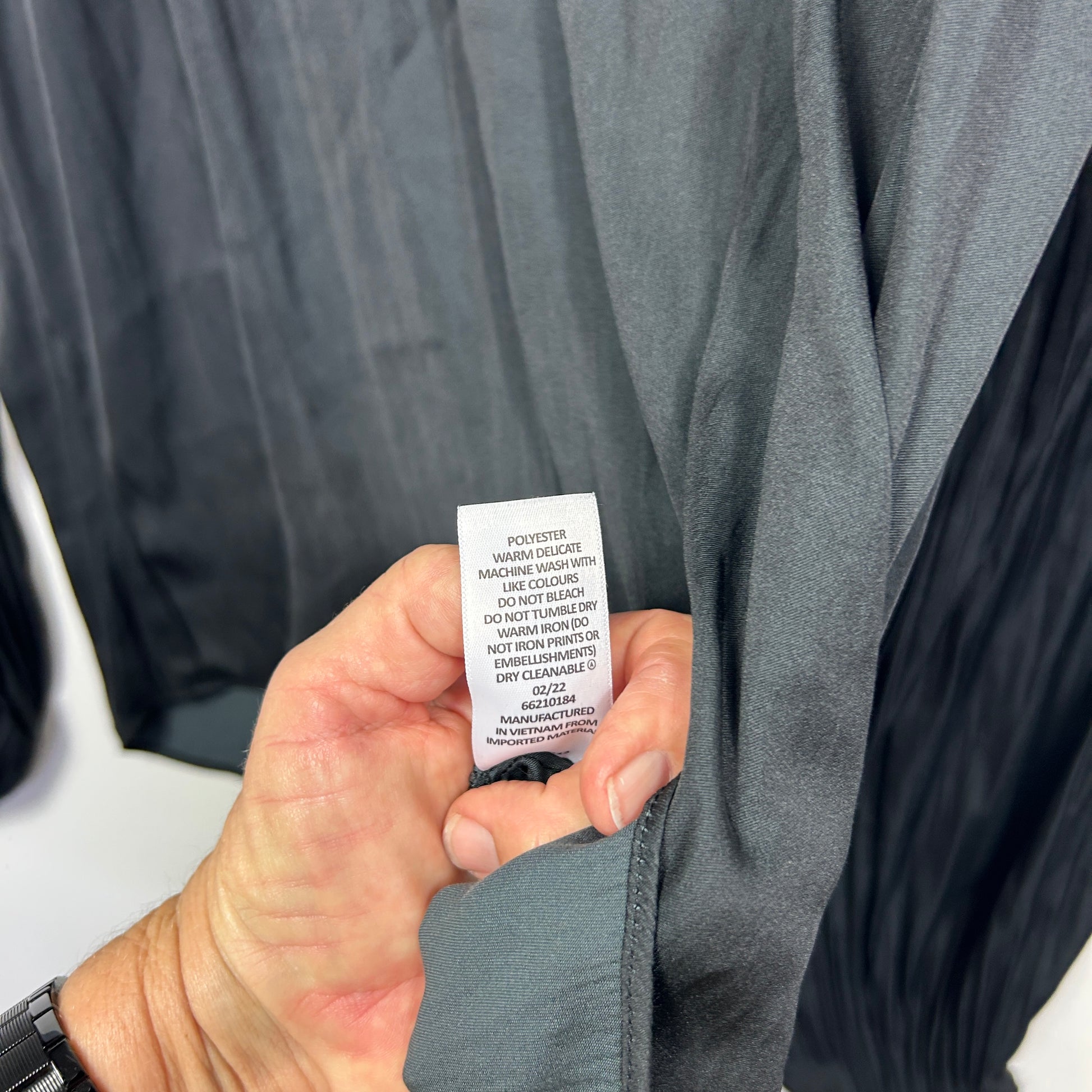 Grey jacket label detail view