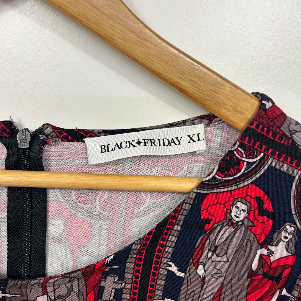 Black Friday XL label and red graphic print dress detail view