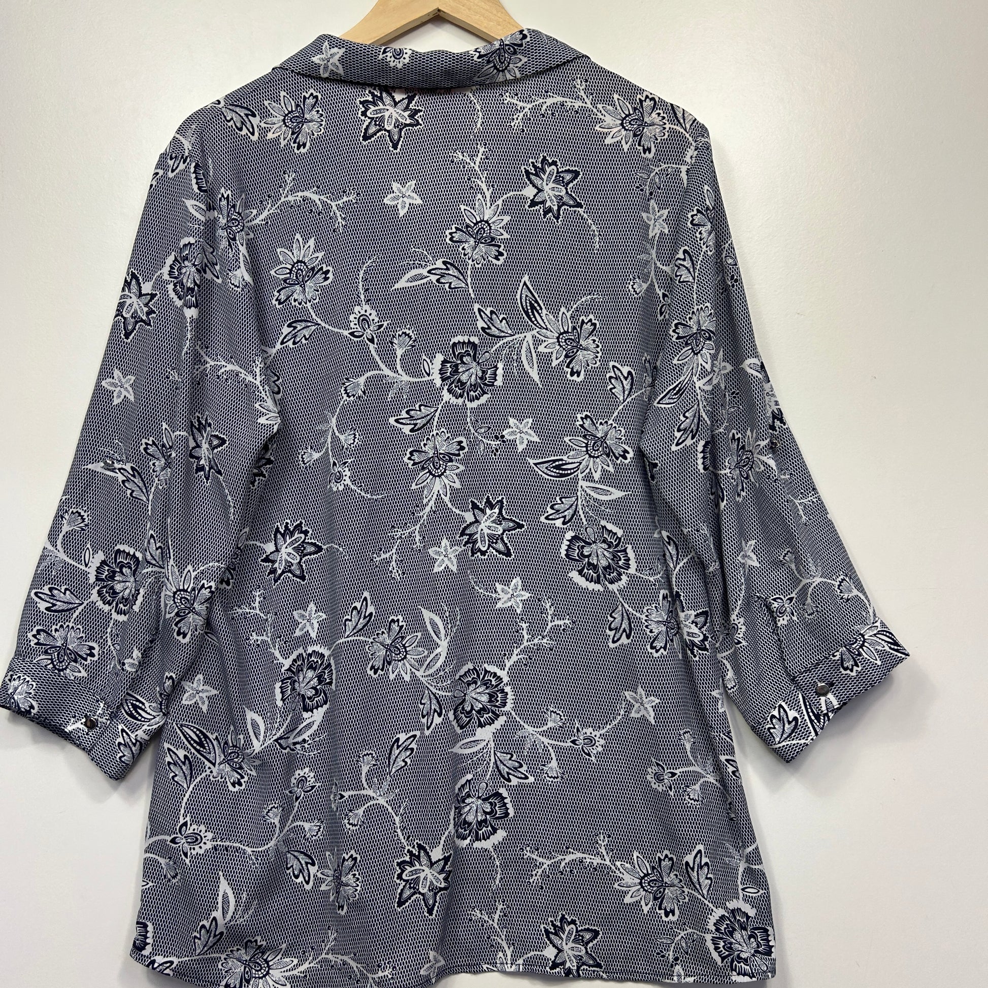 Grey floral shirt back view