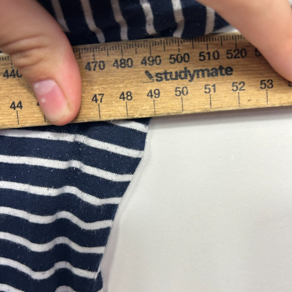Navy and white striped fabric detail view with measuring ruler