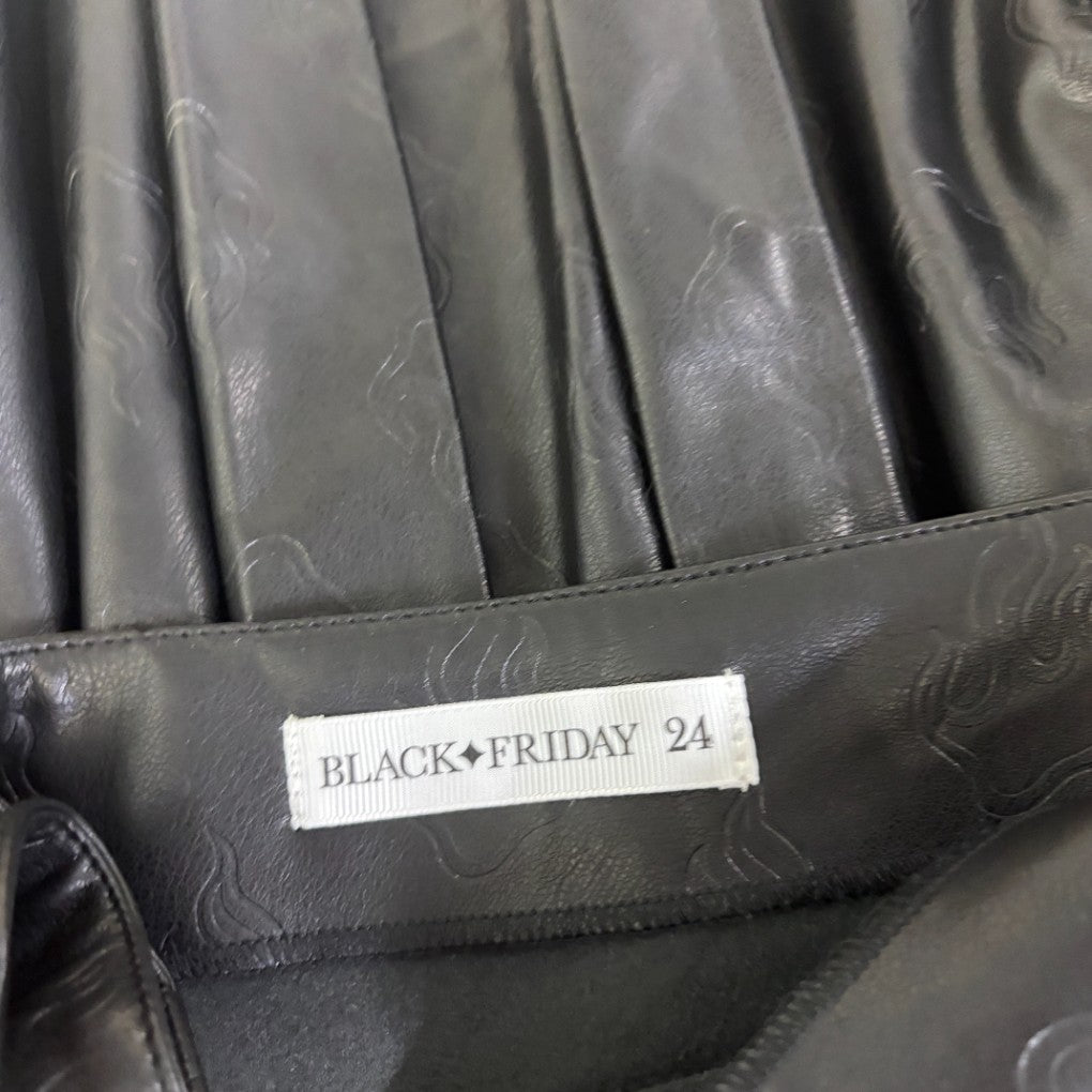Black jacket detail view showing label