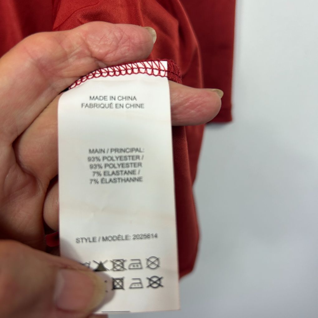 Red garment label detail view