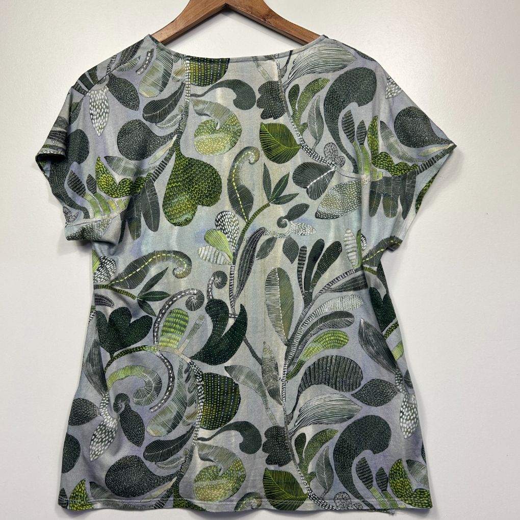 Grey t-shirt with green and navy leaf print front view