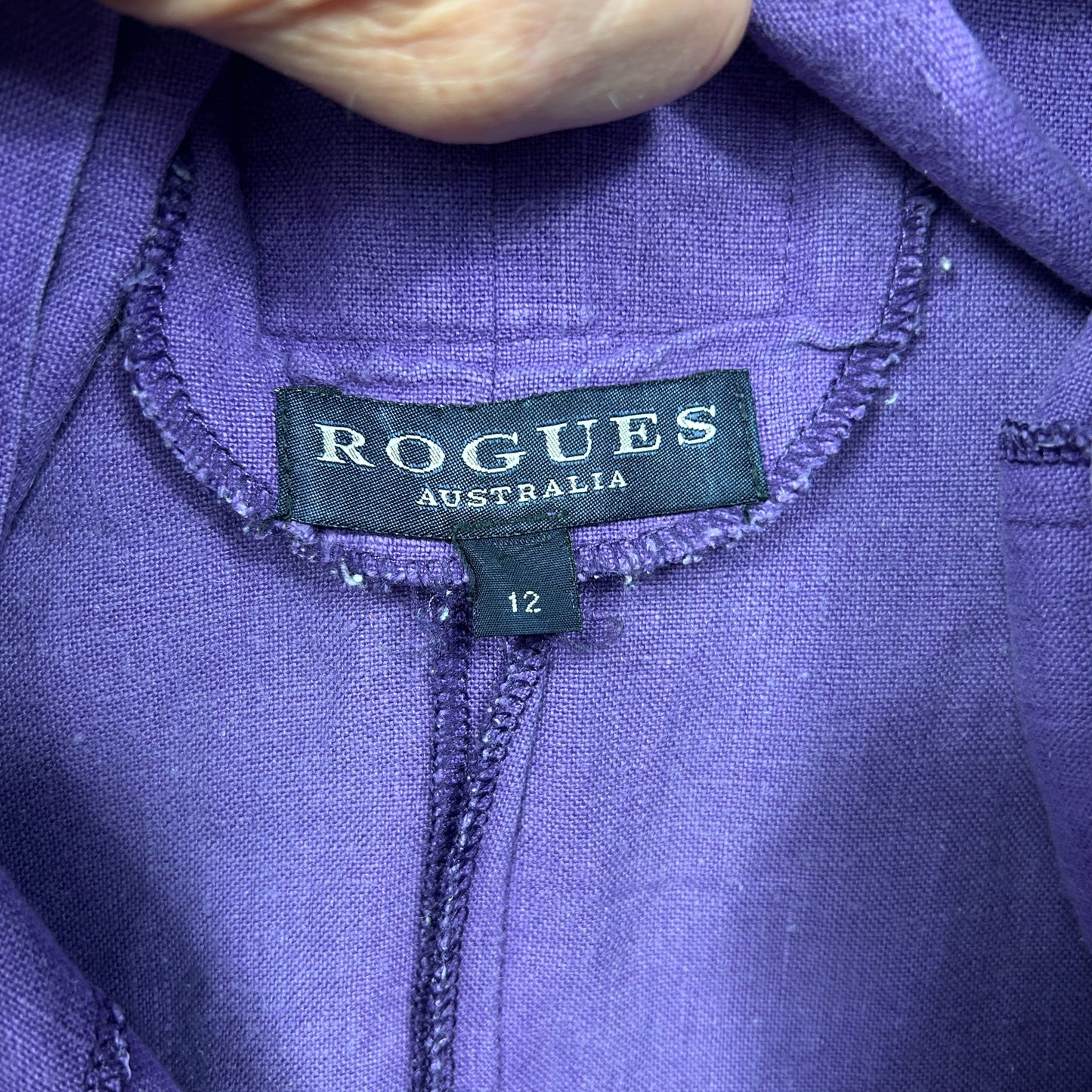 Purple shirt front view with Rogues Australia label