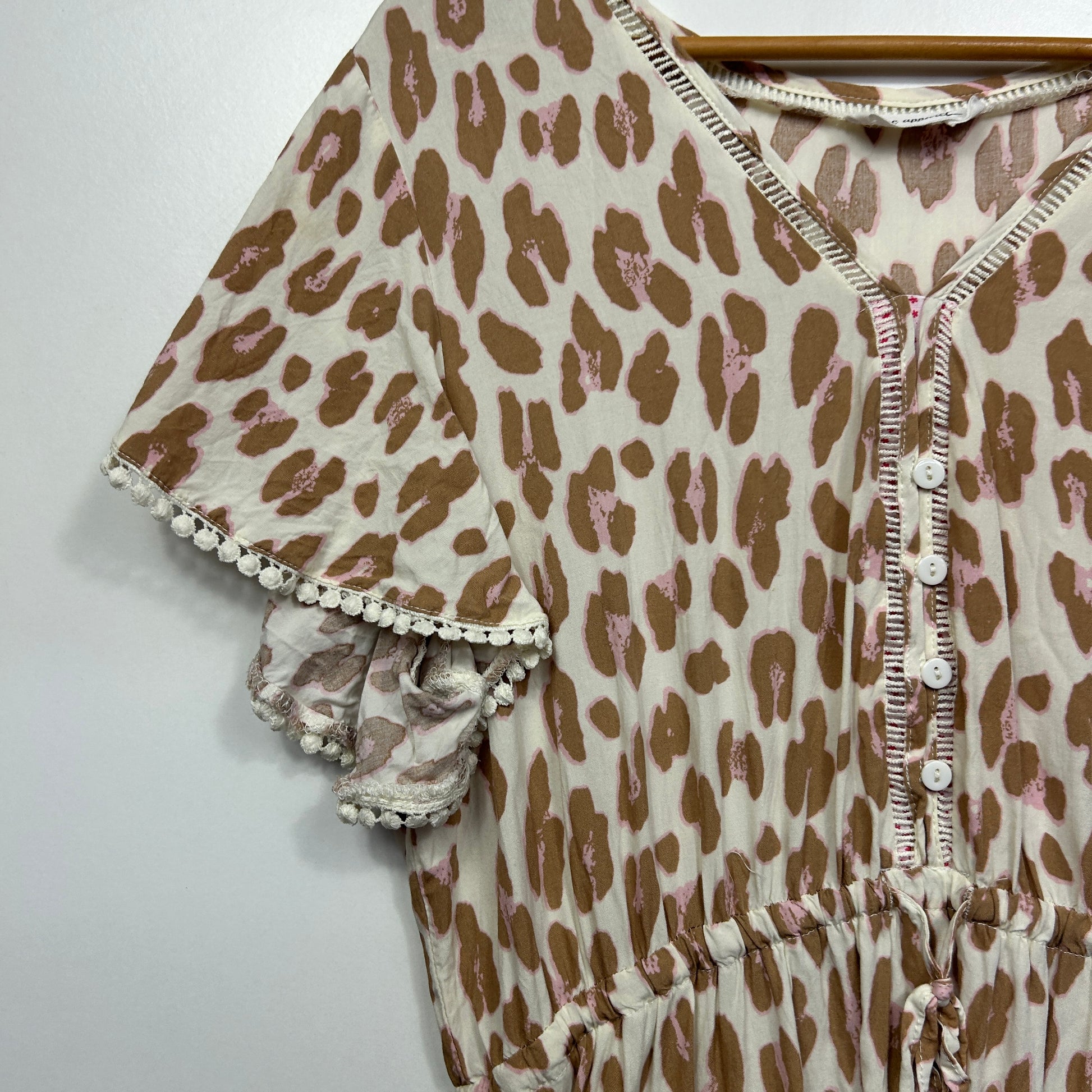 Beige and brown leopard print top front view