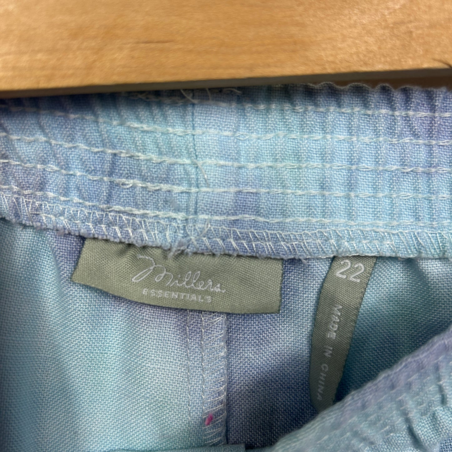 Blue striped shirt label and detail view