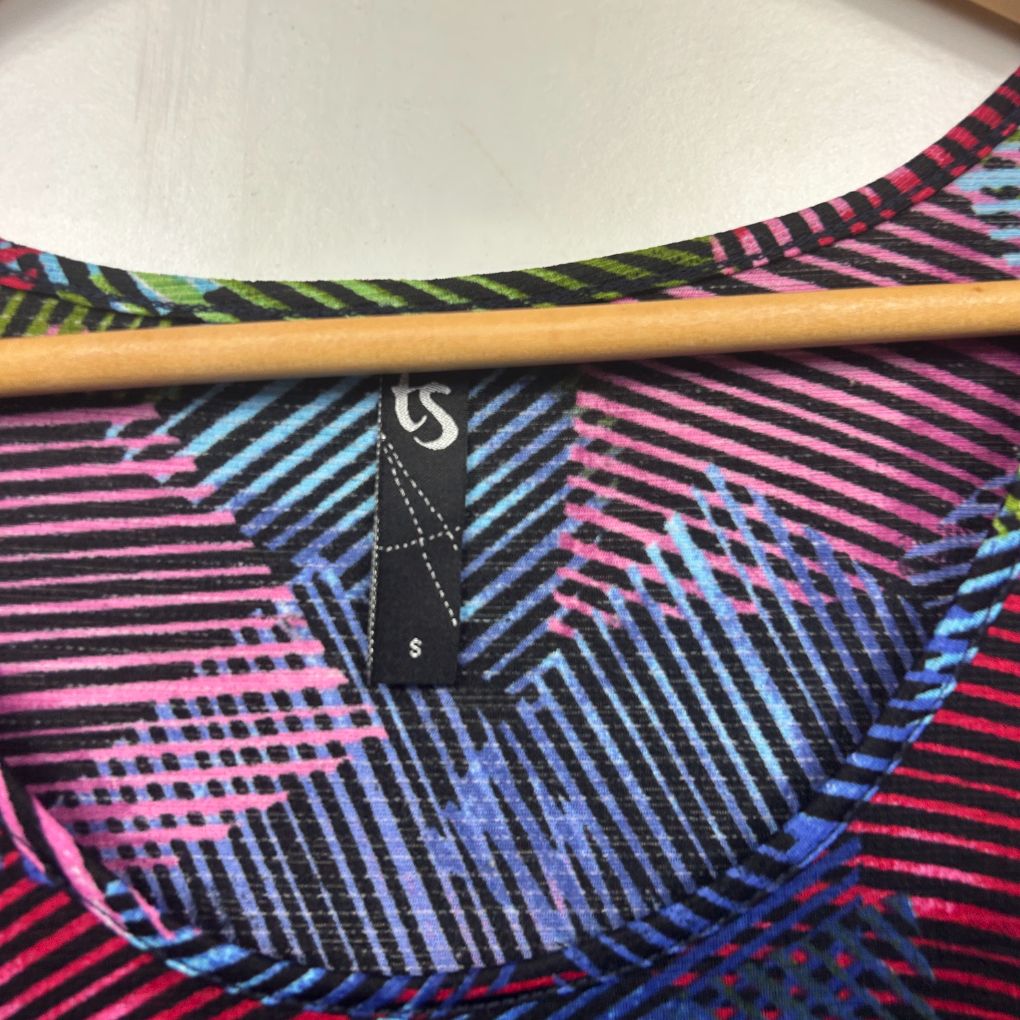 Colorful graphic striped top detail view