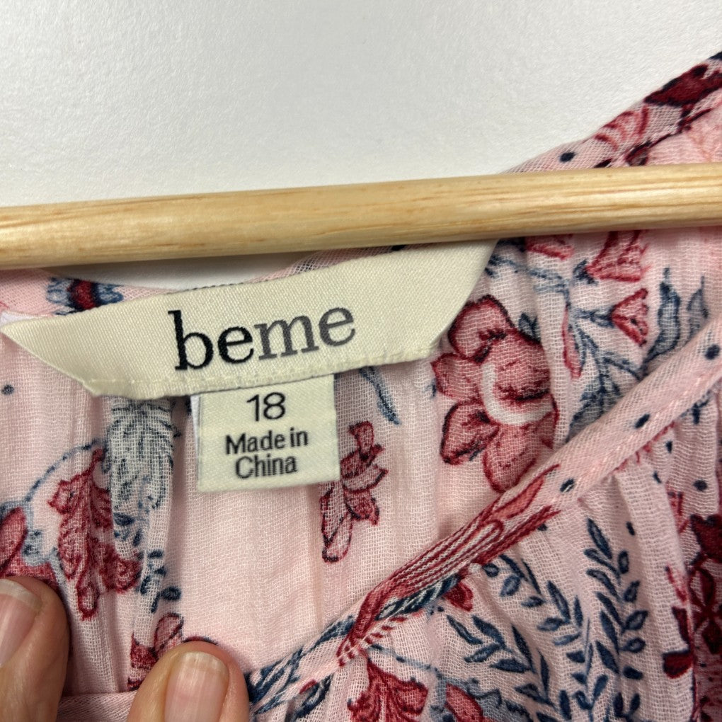 Pink floral blouse label detail view