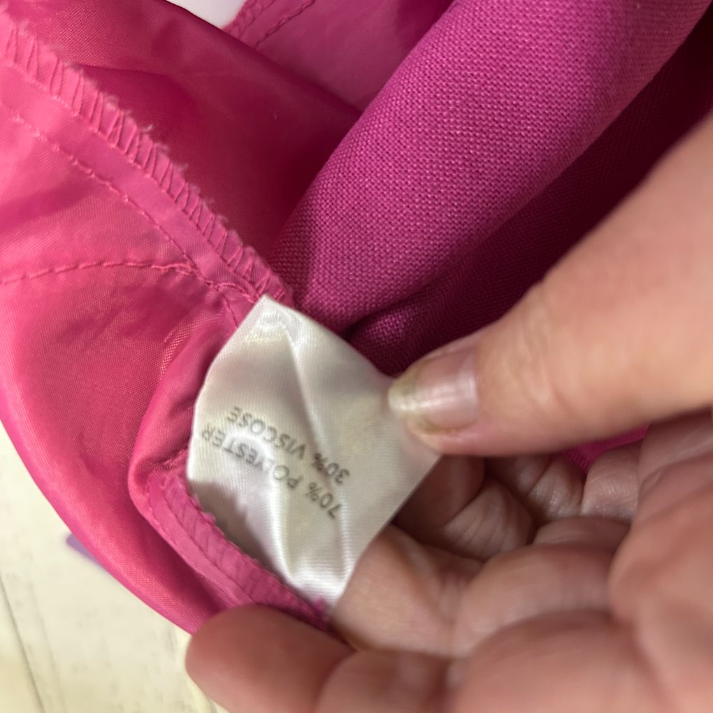 Pink jacket label detail view