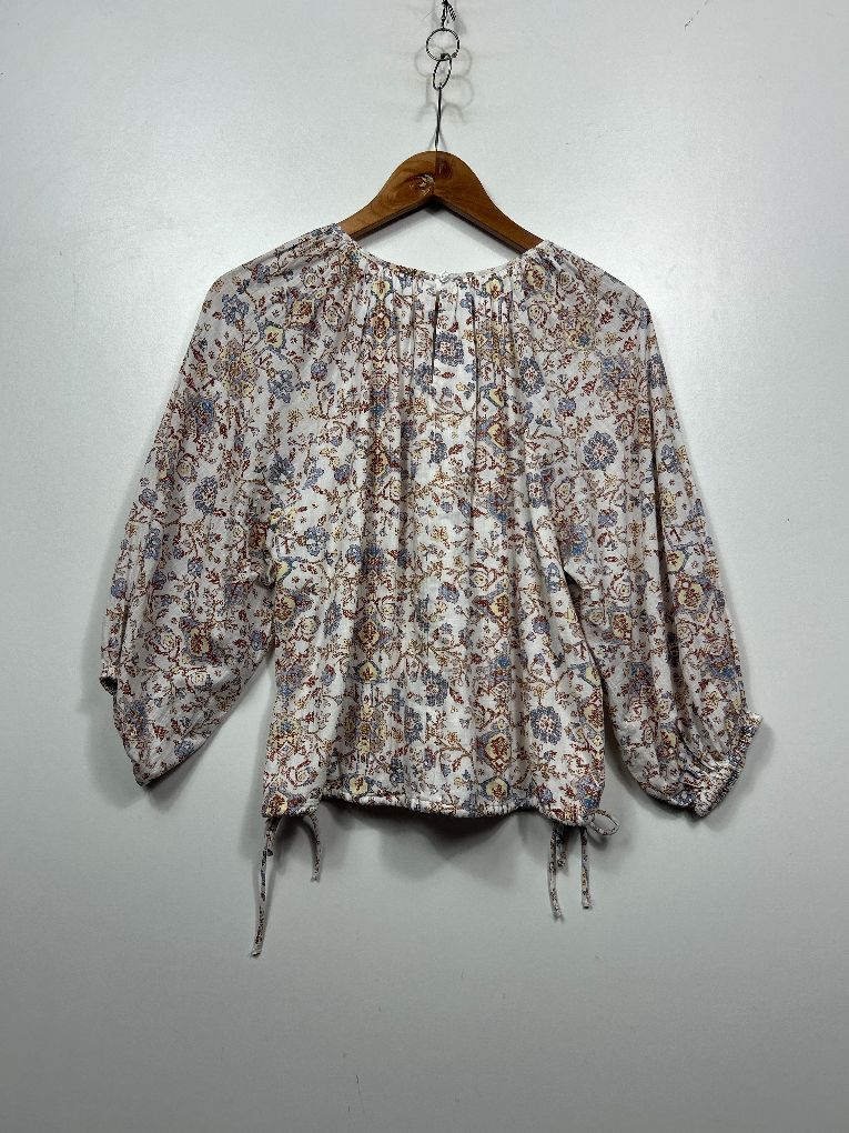 Beige floral blouse front view