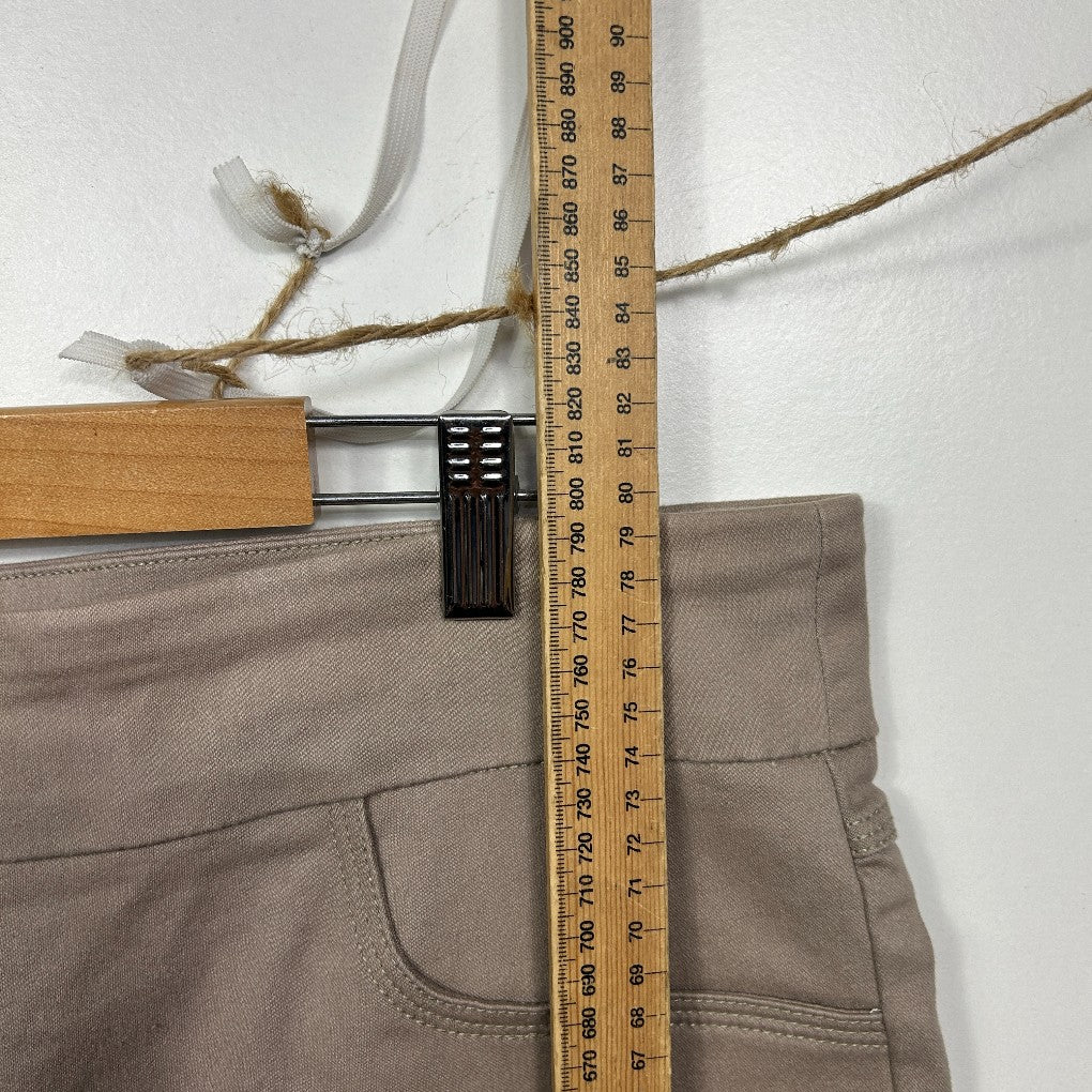 Beige pants front view with measuring tape