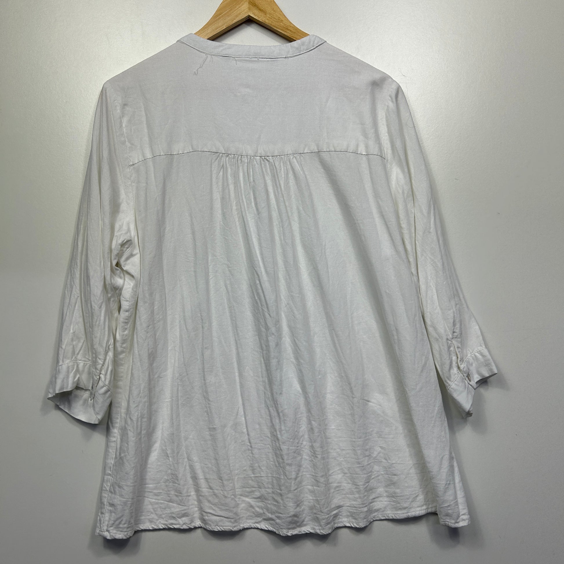 White long sleeve shirt back view