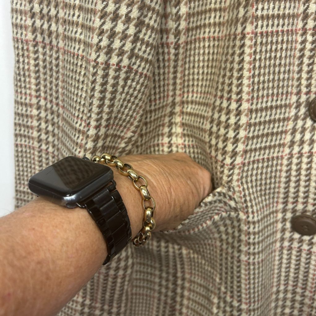 Beige and brown houndstooth blazer detail view