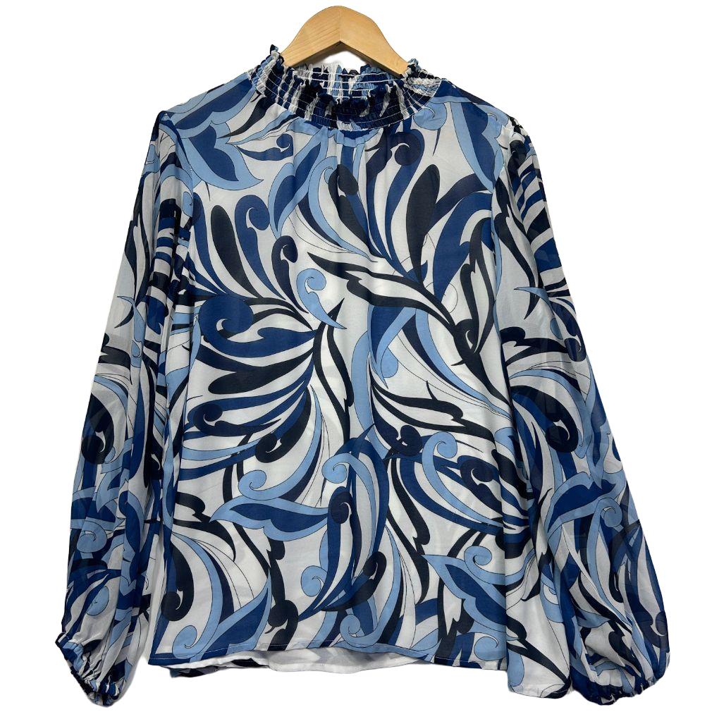 Blue and white abstract patterned long sleeve blouse front view