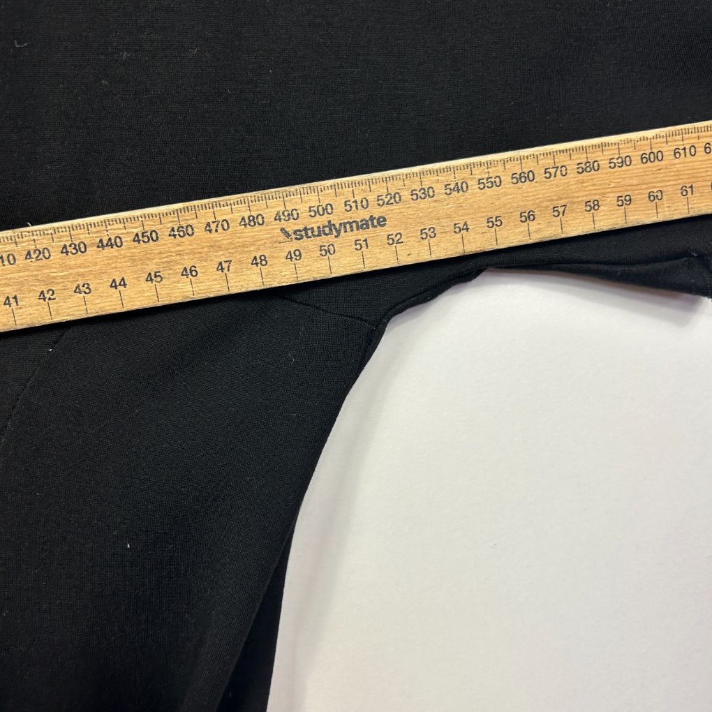 Cream white fabric detail with measuring tape