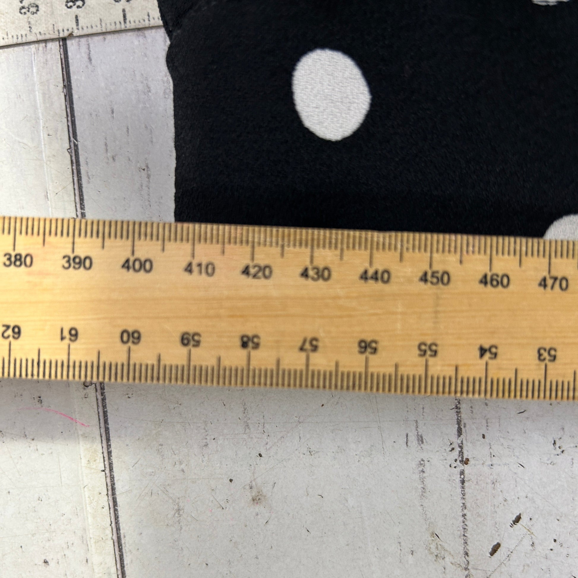 Black fabric with button detail view