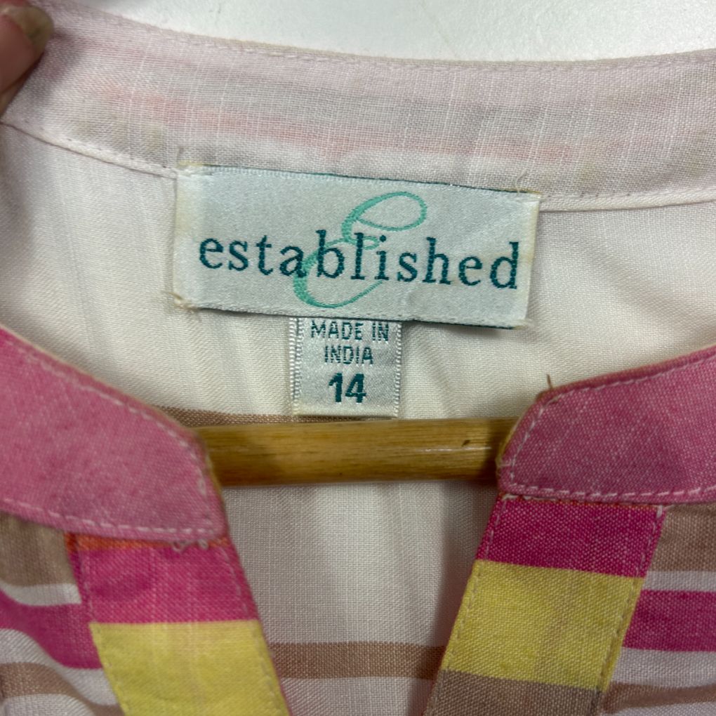 Pink and yellow striped top label detail view