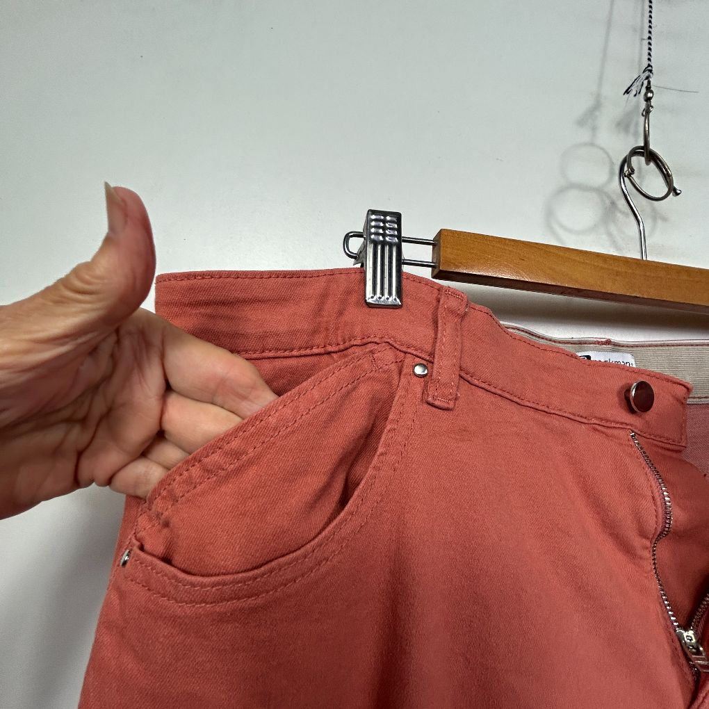Rust red denim shorts detail view