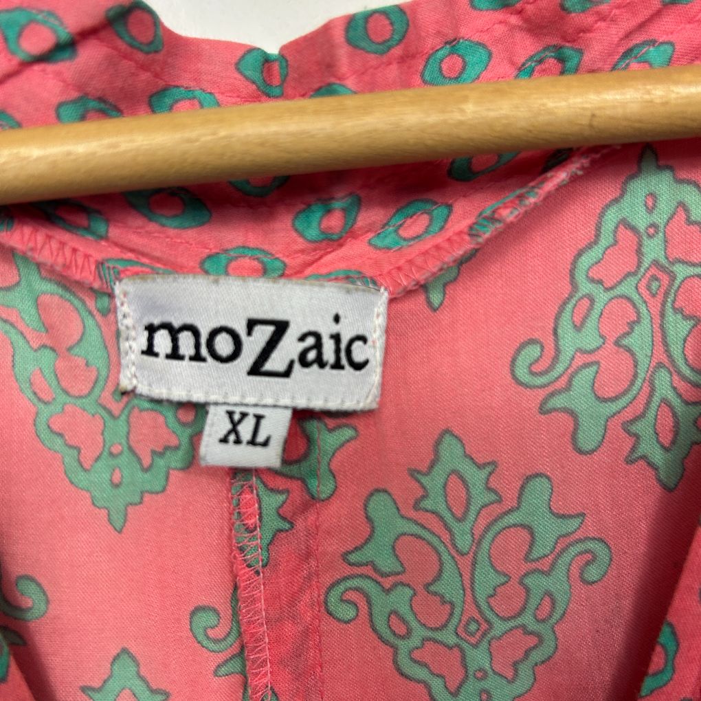 Pink and green patterned shirt label detail