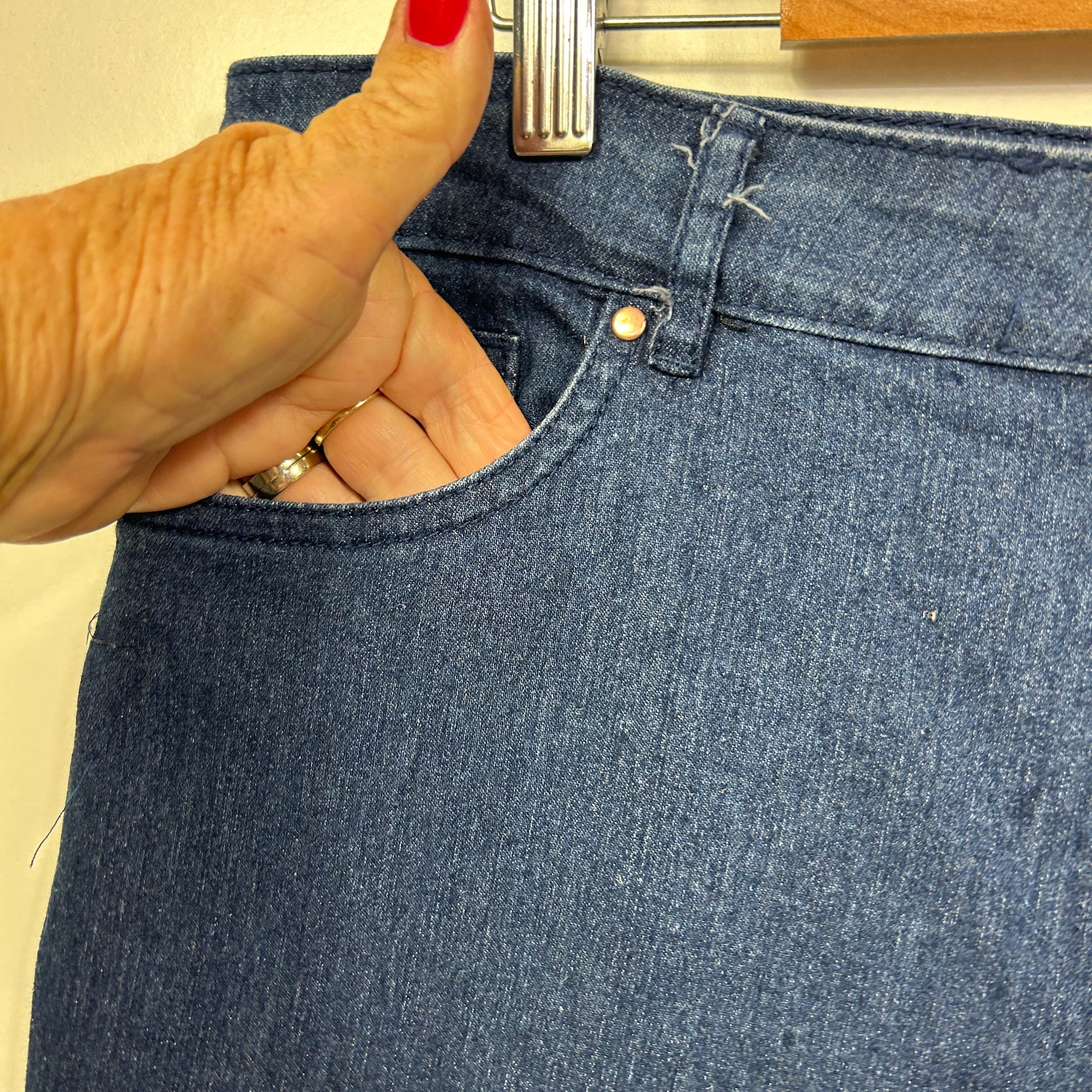 Blue denim jeans front view detail