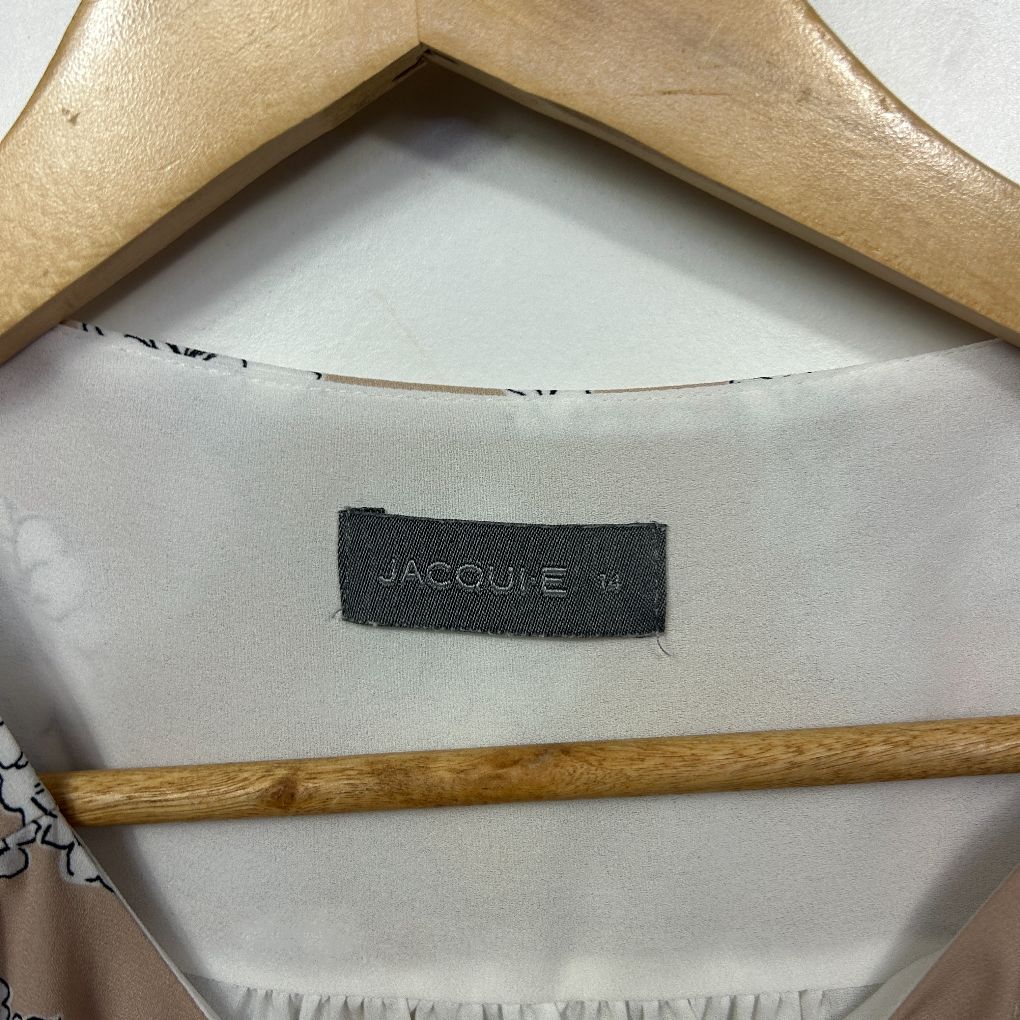 Cream jacket label detail view