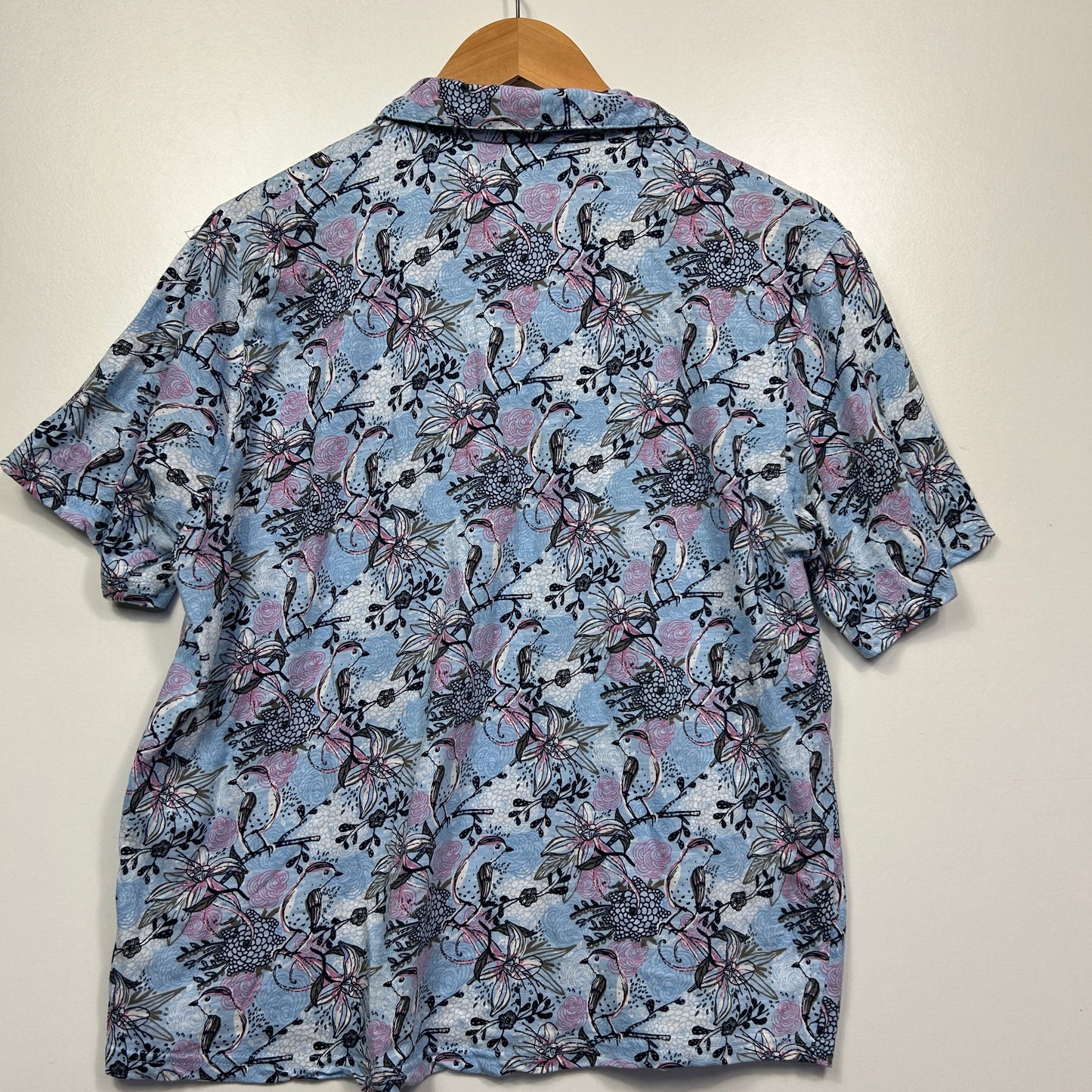 Blue floral short sleeve shirt back view