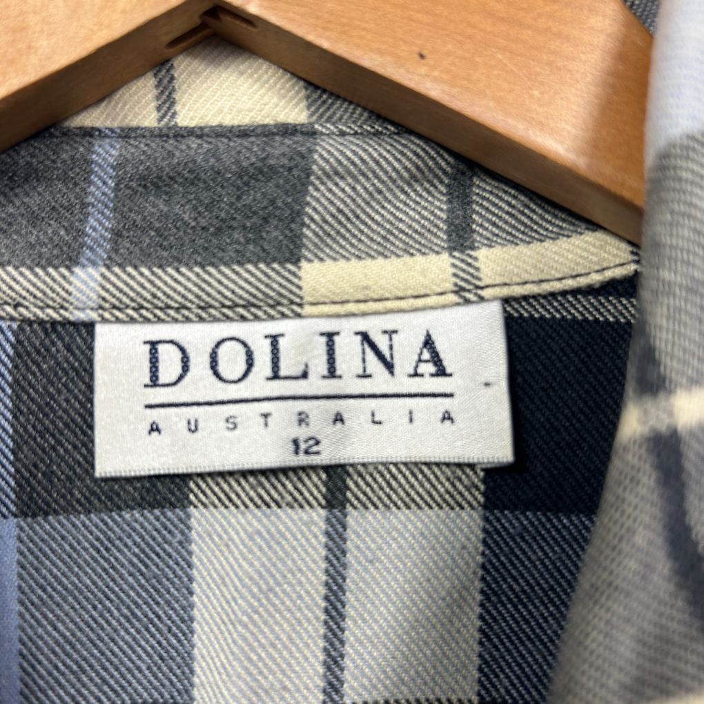 Blue and cream plaid shirt label detail