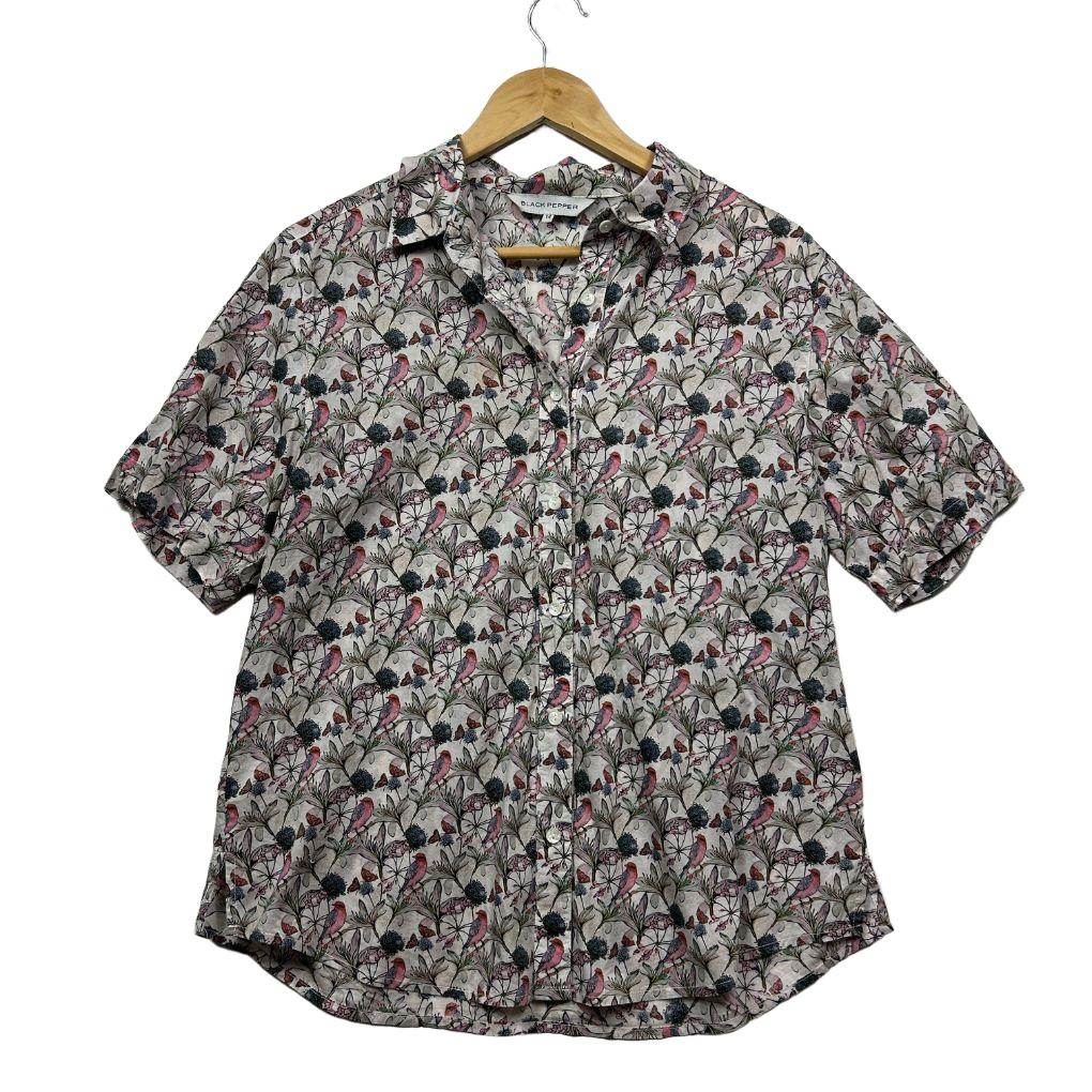 Purple floral shirt front view on hanger