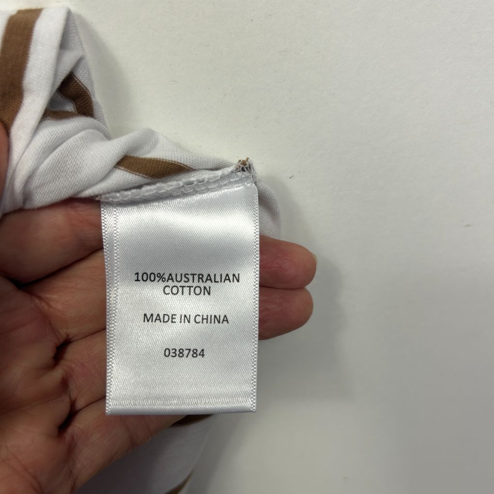 White cotton clothing label detail view